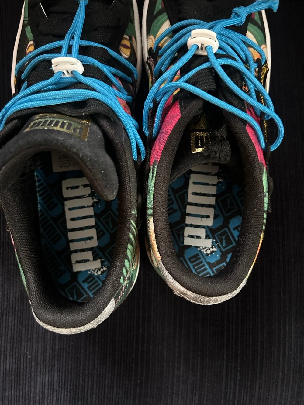 Puma Black Floral Sneakers with Bright Blue Laces